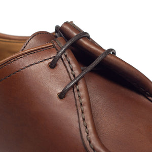 Thuya moccasin toe shoe in espresso brown calf, rubber sole