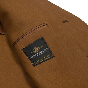 x Sartoria Carrara: Tobacco linen suit in Dugdale 9oz Irish linen