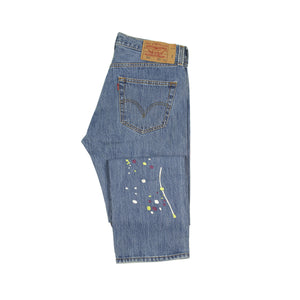 Vintage Levis 501 jeans with embroidered paint splatter, medium wash