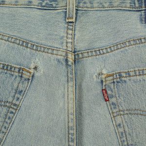 Vintage Levis 501 jeans with embroidered paint splatter, light wash