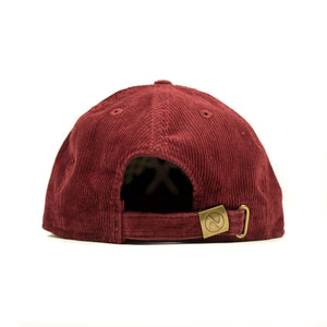 Corduroy cap in crimson with racing flag chainstitched embroidery