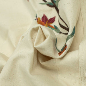 Chintan short sleeve shirt in natural khadi with hand-embroidered floral motifs