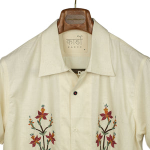 Chintan short sleeve shirt in natural khadi with hand-embroidered floral motifs