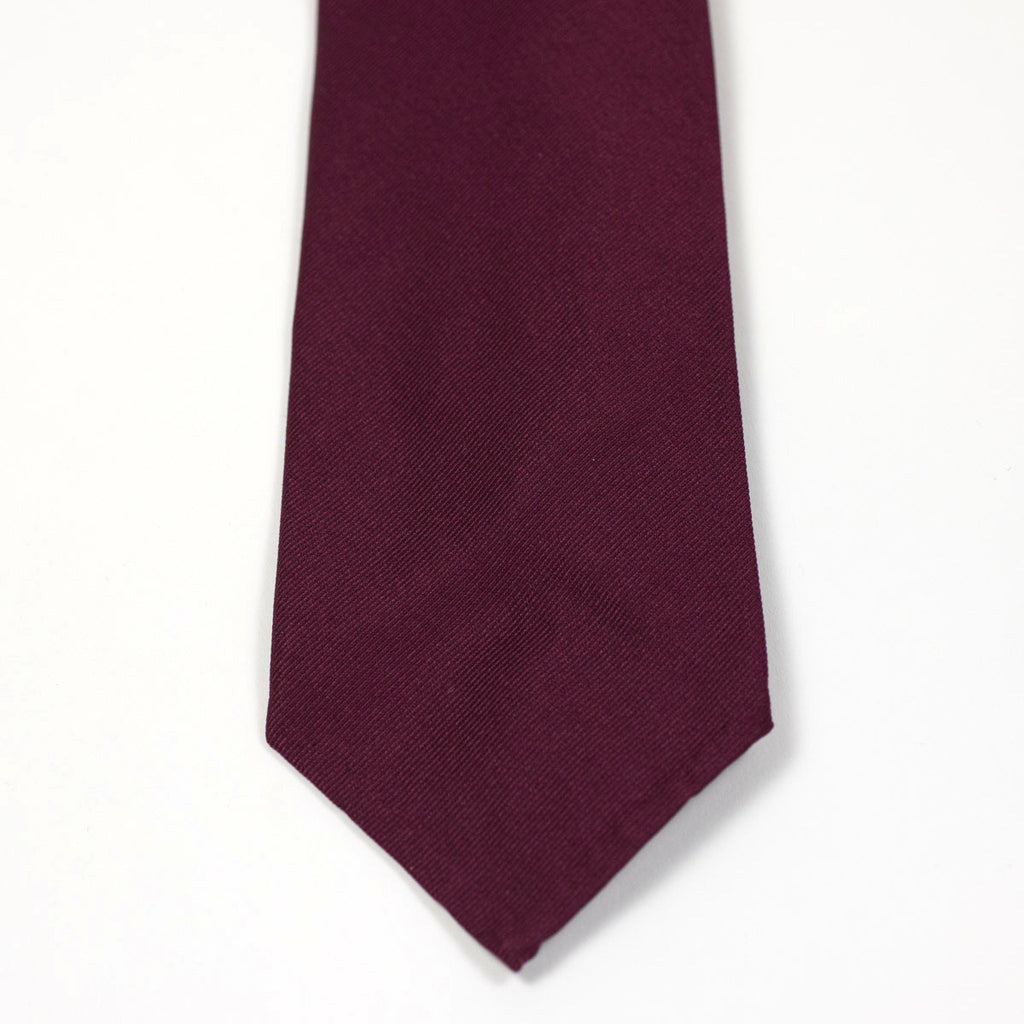 Untipped and handrolled burgundy reppe silk tie – No Man Walks Alone