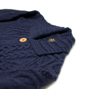 Crazy cable knit Aran cardigan in navy wool