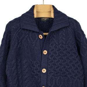 Crazy cable knit Aran cardigan in navy wool