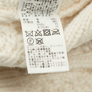 Crazy cable knit Aran cardigan in cream wool