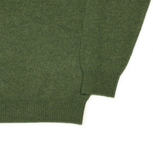 Knit polo in forest green wool