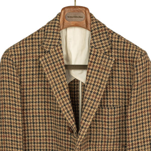Elbow patch sport coat in brown, black, and burgundy guncheck Harris Tweed wool