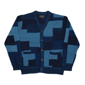 Crazy patchwork cable knit cardigan in indigo-dyed cotton