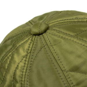 Quilted cap in olive poly