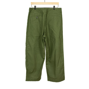 Pleated trousers in green lightweight moleskin