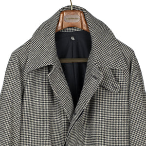 Exclusive Traveler coat in black and ecru houndstooth wool, linen and silk