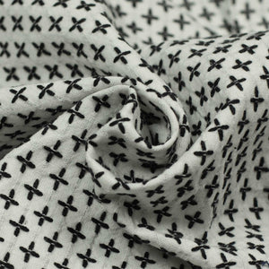 Camp collar shirt in white cotton with black sashiko cross stitches