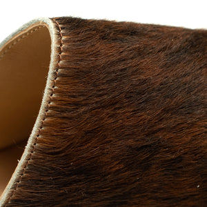 Exclusive mules in hair-on Normande calf