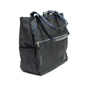 Various convertible tote in navy nylon with luggage strap