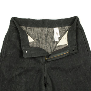 Flat front trousers in black slubby handwoven cotton denim