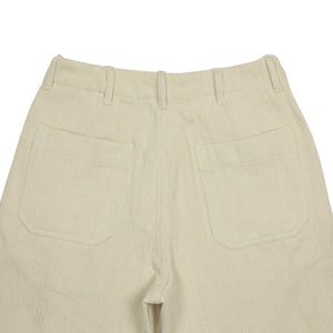 Flat front trousers in natural slubby handwoven cotton denim