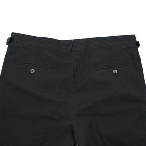 x Sartoria Carrara: pleated trousers in black seersucker (separates)