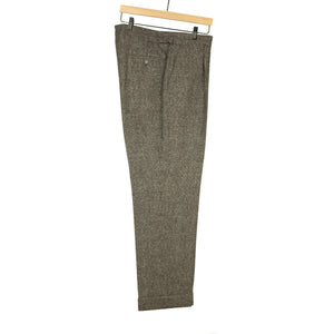 x Sartoria Carrara: Pleated trousers in tonal charcoal Prince-of-Wales undyed wool